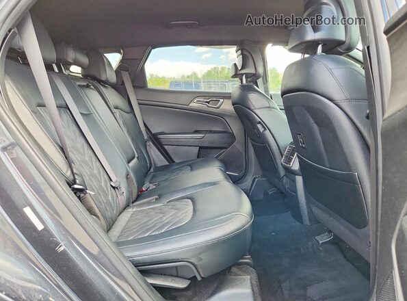 5XYK6CAF2PG074648 2023 KIA SPORTAGE Угольный Вид задней части салона