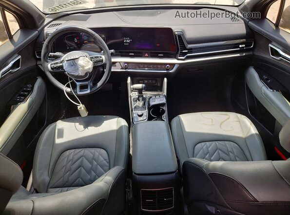 5XYK6CAF5PG024178 2023 KIA SPORTAGE Черный Вид панели приборов