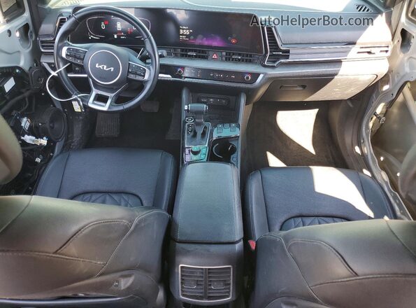 5XYK6CAF5PG072182 2023 KIA SPORTAGE Gray Dashboard view