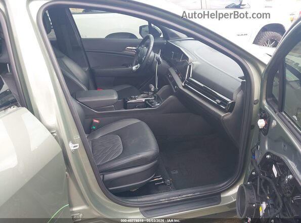 5XYK6CDF3SG255696 2025 KIA SPORTAGE Зеленый Вид салона спереди