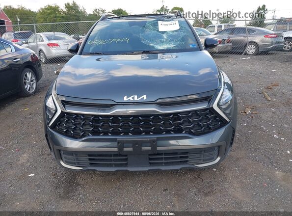 5XYK7CAF5PG031810 2023 KIA SPORTAGE Black Vista del cuadro de instrumentos