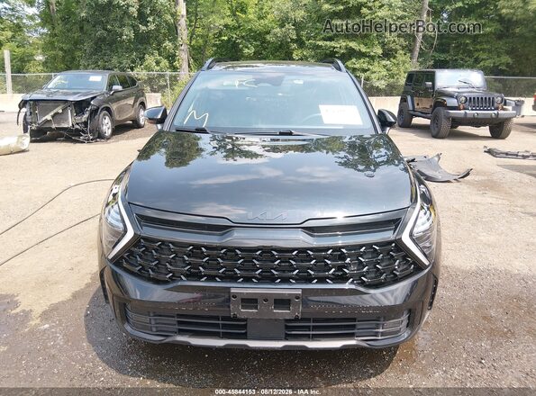 5XYK7CDF4SG278711 2025 KIA SPORTAGE Black Սալոնի հետևի տեսք