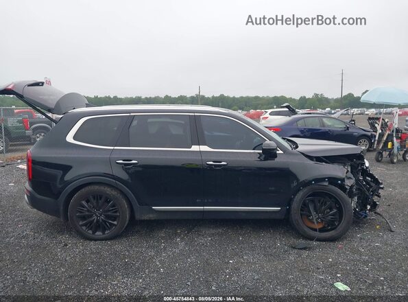5XYP54HC1MG112862 2021 KIA TELLURIDE Black Widok wnętrza z tyłu