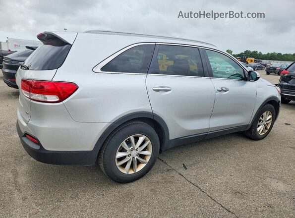 5XYPG4A39GG038647 2016 KIA SORENTO Silver Vista interior delantera