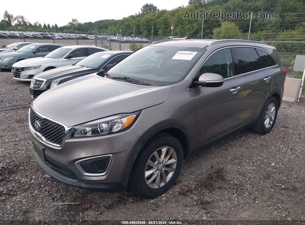 5XYPG4A39GG059725 2016 KIA SORENTO Gray Front left