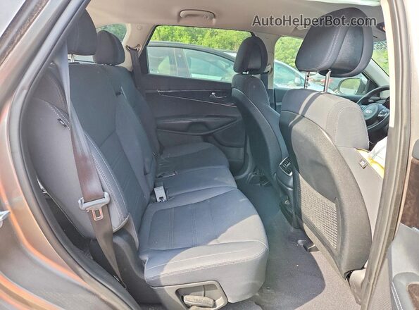 5XYPG4A39GG124816 2016 KIA SORENTO Gray Vista interior trasera