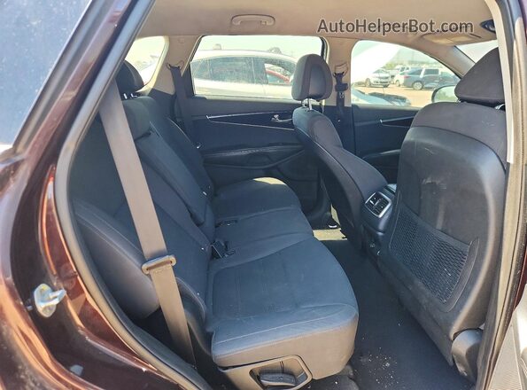5XYPG4A3XGG052363 2016 KIA SORENTO Burgundy Rear seats view