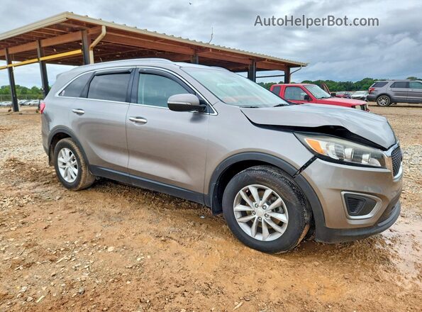5XYPG4A3XGG079675 2016 KIA SORENTO Silver Front right