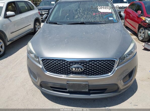 5XYPG4A5XHG190889 2017 KIA SORENTO Brown Front view