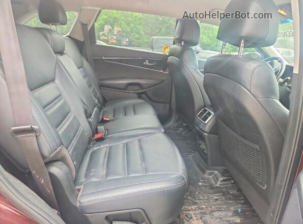 5XYPGDA39HG329179 2017 KIA SORENTO Burgundy Vista de los asientos traseros