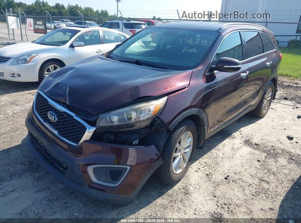 5XYPGDA57GG014087 2016 KIA SORENTO Maroon Vista tres cuartos delantera izquierda