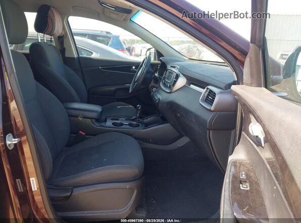 5XYPGDA57GG014087 2016 KIA SORENTO Maroon Vista interior delantera