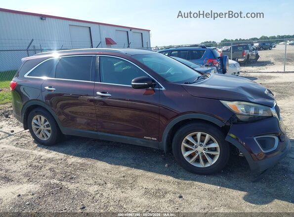 5XYPGDA57GG014087 2016 KIA SORENTO Maroon Vista interior trasera