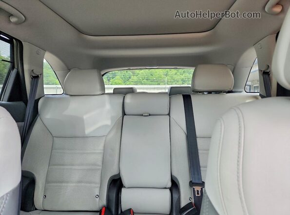 5XYPKDA53GG113777 2016 KIA SORENTO Black Vista de los asientos traseros