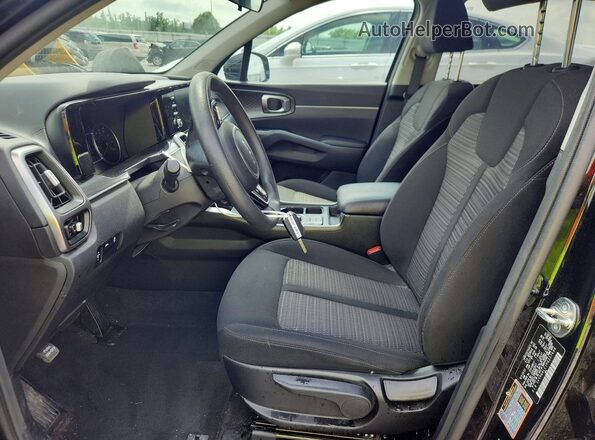 5XYRG4LC1PG237696 2023 KIA SORENTO Black Front interior view