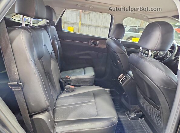 5XYRHDLF7PG163854 2023 KIA SORENTO Charcoal Rear interior view
