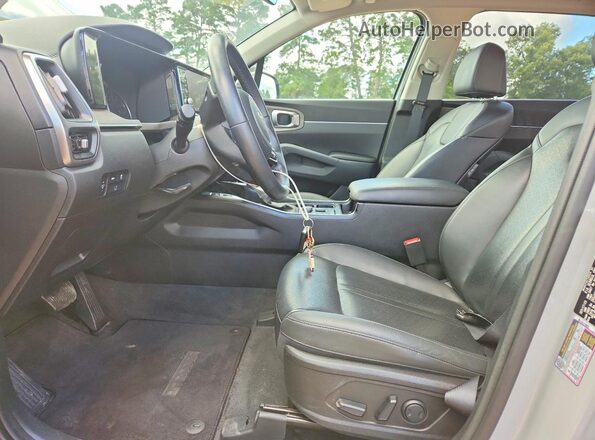 5XYRHDLFXPG231578 2023 KIA SORENTO Серый Вид салона спереди