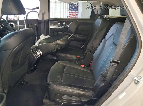 5XYRKDLF3PG200979 2023 KIA SORENTO Серый Вид задней части салона
