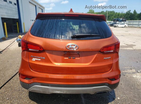 5XYZT3LB7HG381056 2017 HYUNDAI SANTA Оранжевый Вид сзади