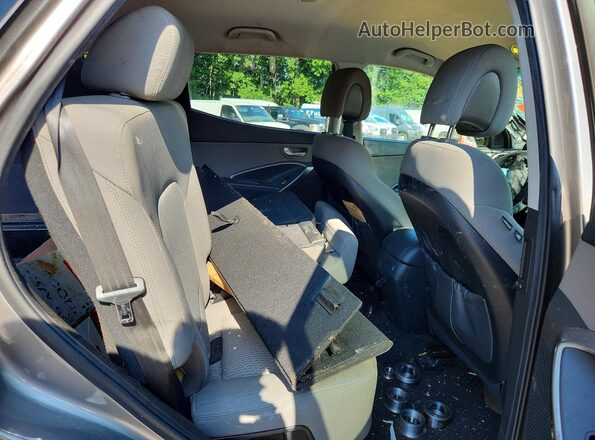 5XYZTDLB0JG569686 2018 HYUNDAI SANTA Black Rear interior view