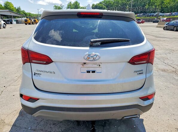5XYZTDLB4HG495263 2017 HYUNDAI SANTA Серебряный Вид сзади