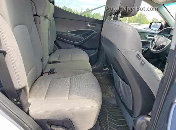 5XYZTDLB4HG495263 2017 HYUNDAI SANTA Серебряный Вид задней части салона