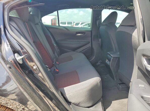 5YFB4MCE0RP170065 2024 TOYOTA COROLLA Black Vista interior trasera