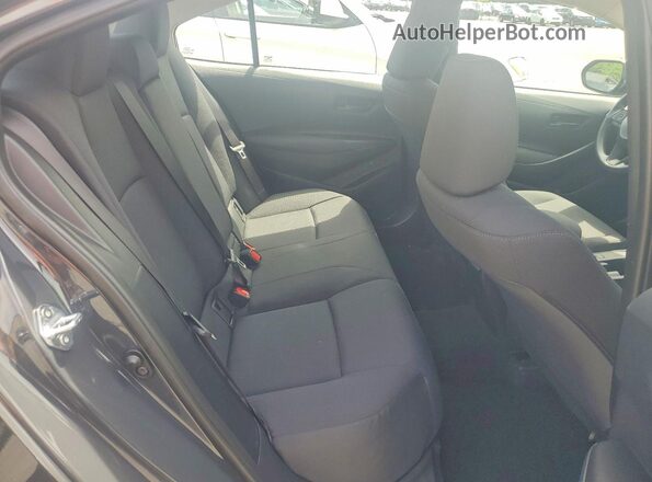 5YFB4MDE0TP383720 2026 TOYOTA COROLLA Gray Vista de los asientos traseros