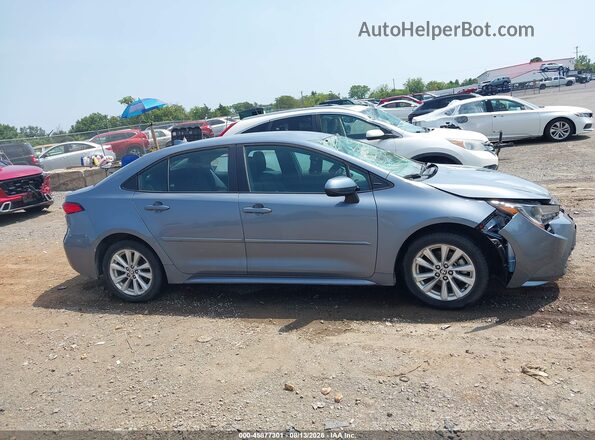 5YFB4MDE1RP134447 2024 TOYOTA COROLLA Синий Вид задней части салона