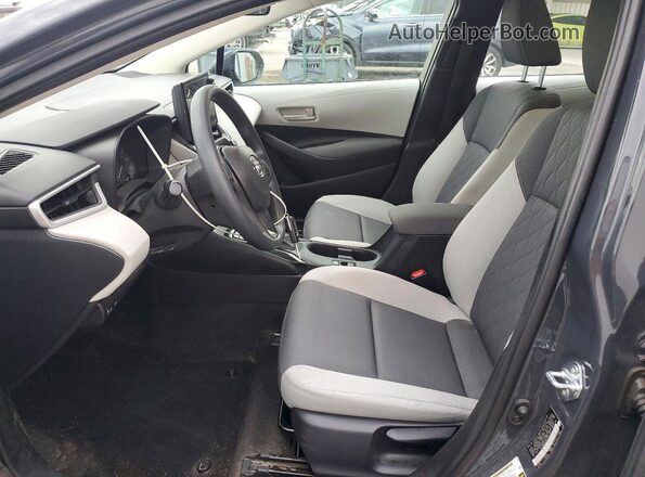 5YFB4MDE6SP338232 2025 TOYOTA COROLLA Gray Vista interior delantera
