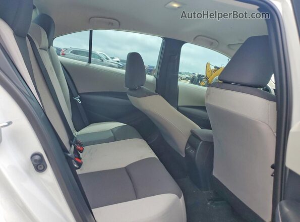 5YFB4MDE6TP404067 2026 TOYOTA COROLLA White Vista de los asientos traseros
