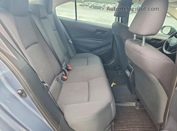 5YFB4MDE6TP446366 2026 TOYOTA COROLLA Gray Vista de los asientos traseros