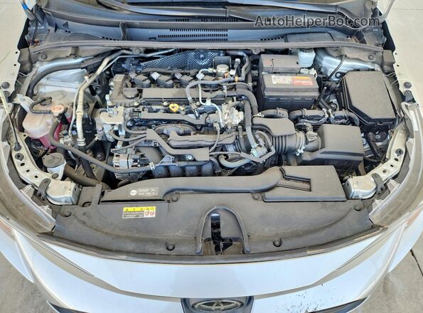 5YFB4MDEXRP163686 2024 TOYOTA COROLLA Silver Սալոնի հետևի տեսք