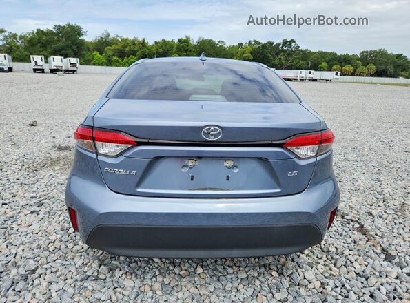 5YFB4MDEXRP189625 2024 TOYOTA COROLLA Turquoise Rear view