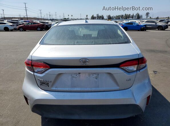5YFB4MDEXRP197479 2024 TOYOTA COROLLA Silver Հետևի տեսք