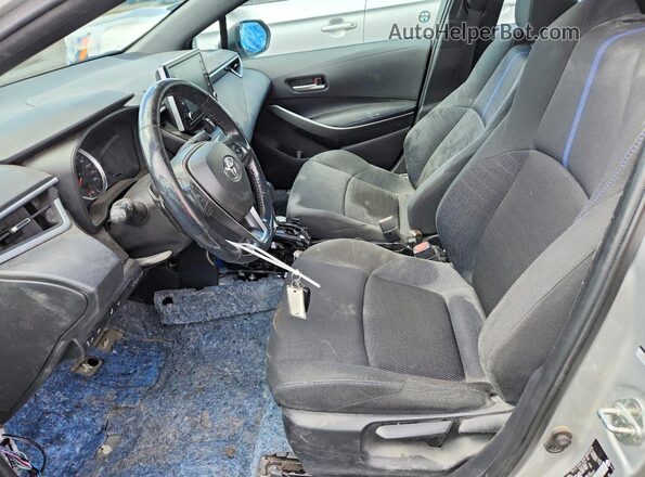 5YFB4RBEXLP026027 2020 TOYOTA COROLLA Silver Widok wnętrza z przodu