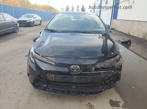 5YFBPMBE9MP180319 2021 TOYOTA COROLLA Black Widok wnętrza z tyłu