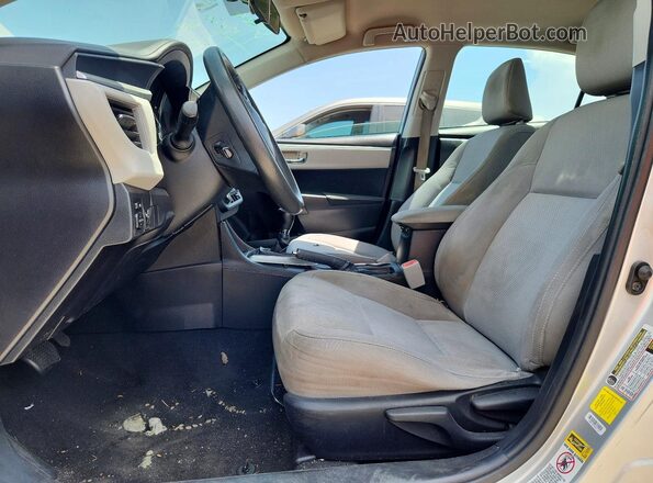 5YFBURHE0GP489128 2016 TOYOTA COROLLA Серебряный Вид салона спереди