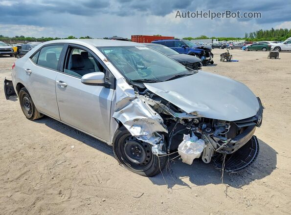 5YFBURHE0GP489128 2016 TOYOTA COROLLA Серебряный Передняя правая четверть