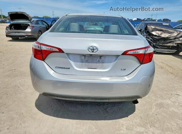5YFBURHE0GP489128 2016 TOYOTA COROLLA Серебряный Вид сзади
