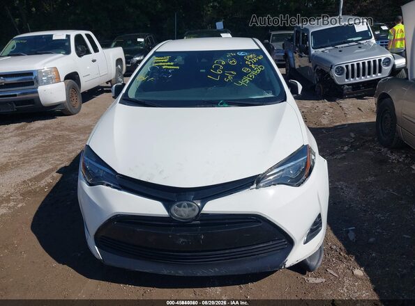 5YFBURHE0KP866159 2019 TOYOTA COROLLA Белый Вид щитка приборов