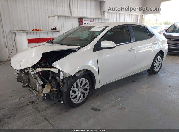 5YFBURHE0KP927106 2019 TOYOTA COROLLA Белый Передняя левая четверть