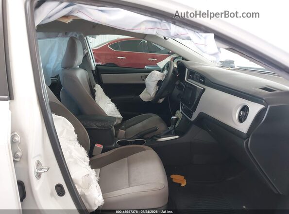5YFBURHE0KP927106 2019 TOYOTA COROLLA Белый Вид салона спереди