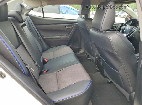 5YFBURHE0KP948327 2019 TOYOTA COROLLA White Rear seats view