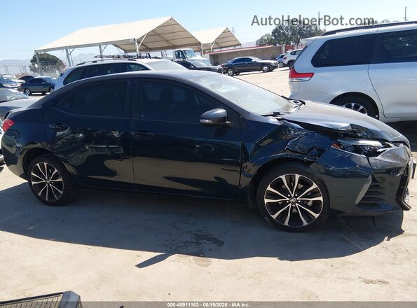 5YFBURHE1HP672006 2017 TOYOTA COROLLA Blue Вид задньої частини салону