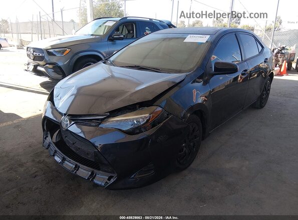 5YFBURHE1HP692269 2017 TOYOTA COROLLA Black Առջևի ձախ երեք քառորդ տեսարան