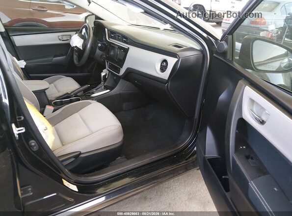 5YFBURHE1HP692269 2017 TOYOTA COROLLA Black Սալոնի դիմացի տեսք