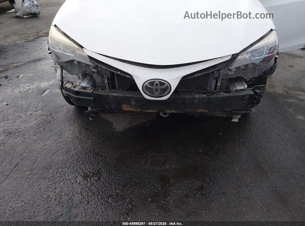5YFBURHE1JP751875 2018 TOYOTA COROLLA Белый Вид спереди