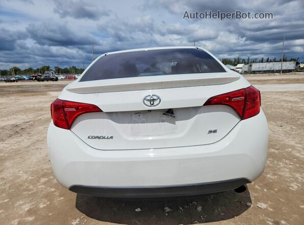 5YFBURHE1KP856286 2019 TOYOTA COROLLA White Vista trasera