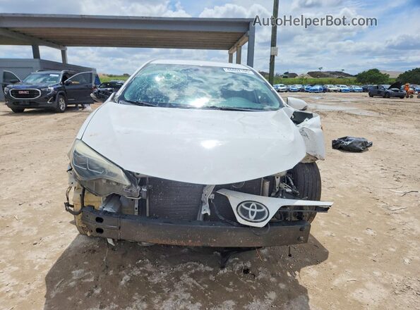 5YFBURHE1KP856286 2019 TOYOTA COROLLA White Vista frontal